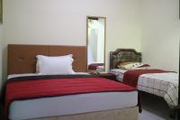 Chambre Triple - Vue sur Jardin