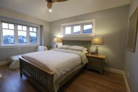 Kamer met Queensize Bed en Uitzicht op de Tuin