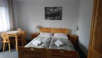 Dreibettzimmer mit Bergblick