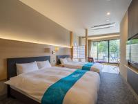 Deluxe Doppelzimmer mit 2 Doppelbetten