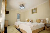 Tweepersoonskamer met 2 Aparte Bedden en Bad