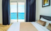 Oceanfront 4-bedroom villa with pool