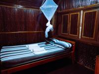 Camera Singola con Doccia e Servizi Igienici in Comune