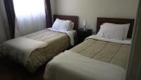 Chambre Lits Jumeaux avec Salle de Bains Privative