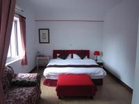 Kamer met Kingsize Bed en Uitzicht op de Tuin