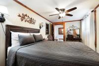 Zimmer mit Queensize-Bett und Gartenblick