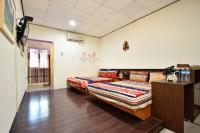 Chambre Quadruple avec Salle de Bains Privative