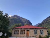 Guest House Malkhaz Niguriani - Ferienwohnung Zhabeshi