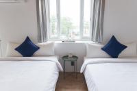 Quadruple Room with City View and Balcony
