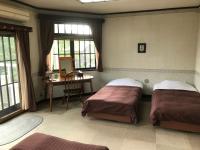 Vierbettzimmer mit Balkon