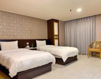 Jing Dian Business Hotel - Chambres d’hôtes