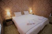 Tweepersoonskamer met 1 of 2 Bedden en Gedeelde Badkamer