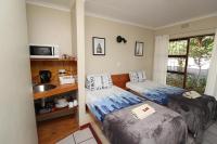 Habitación Doble con baño privado - 2 camas