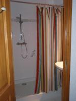 Dreibettzimmer mit Gartenblick