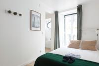 Estudio con cocina y sofá cama