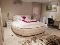 Zimmer mit Queensize-Bett