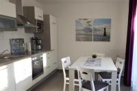 B&B Dangast - Haus am Meer Whg. 1 EG Edo-Wiemken-Str. 48, 75qm 4 Personen - Bed and Breakfast Dangast