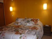 Suite mit Kingsize-Bett mit Whirlpool