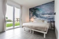 Deluxe Room with Patio and Pool View	
