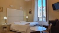 Chambre Double ou Lits Jumeaux avec Balcon - Vue sur Place