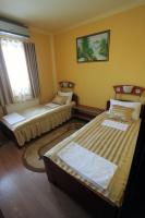 Tweepersoonskamer met 2 Aparte Bedden