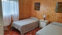 Camera Matrimoniale/Doppia con Letti Singoli con Bagno Privato Esterno