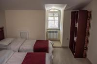 Camera Matrimoniale/Doppia con Letti Singoli con Bagno in Comune