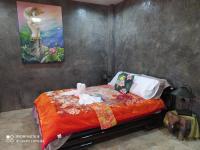 Zimmer mit Queensize-Bett und Gartenblick