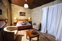Traditionelle Suite aus Naturstein mit 1 Schlafzimmer und Whirlpool-Badewanne