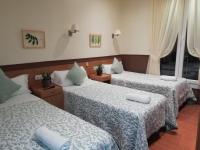 Camera Tripla con Bagno in Comune (3 Letti)
