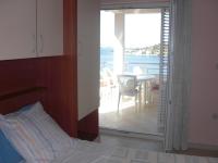 Three-Bedroom Apartment with Balcony and Sea View (6 Adults)