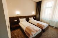Tweepersoonskamer met 2 Aparte Bedden
