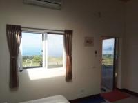 Vierpersoonskamer met Uitzicht op Zee