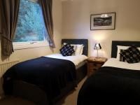 Zweibettzimmer mit eigenem Bad außerhalb des Zimmers