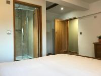 Deluxe Zimmer mit Kingsize-Bett