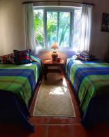 Habitación Triple con vistas al jardín