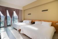 Zimmer mit 2 Queensize-Betten