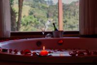 Chalet with Spa Bath and Waterfall View