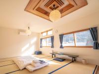 Chambre Quadruple avec Salle de Bains Commune