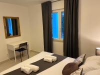 Appartamento con 2 Camere da Letto e Vista Giardino