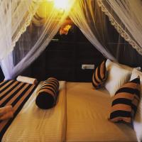 Kamer met Kingsize Bed en Uitzicht op de Bergen