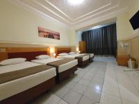 Quadruple Room with Shared Bathroom