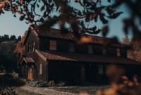 Apartamenty Drewniany Dom - B&B