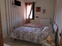 Tweepersoonskamer met 1 of 2 Bedden en Gedeelde Badkamer