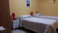 Tweepersoonskamer met 1 of 2 Bedden en Gedeelde Badkamer