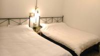 Quadruple Room with Shared Bathroom