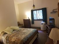 Zimmer mit Queensize-Bett