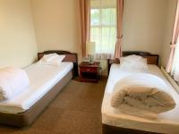 Chambre Lits Jumeaux avec Salle de Bains Privative