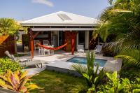 Fleurs de canne piscines privées - Ferienwohnung Le Moule