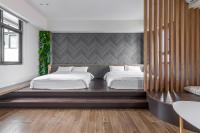 Camera Familiare Deluxe con Balcone e Vista Giardino